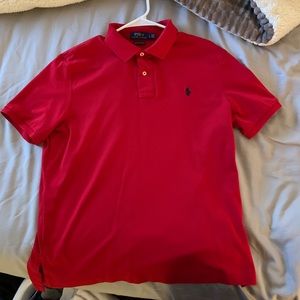Red short sleeve polo.